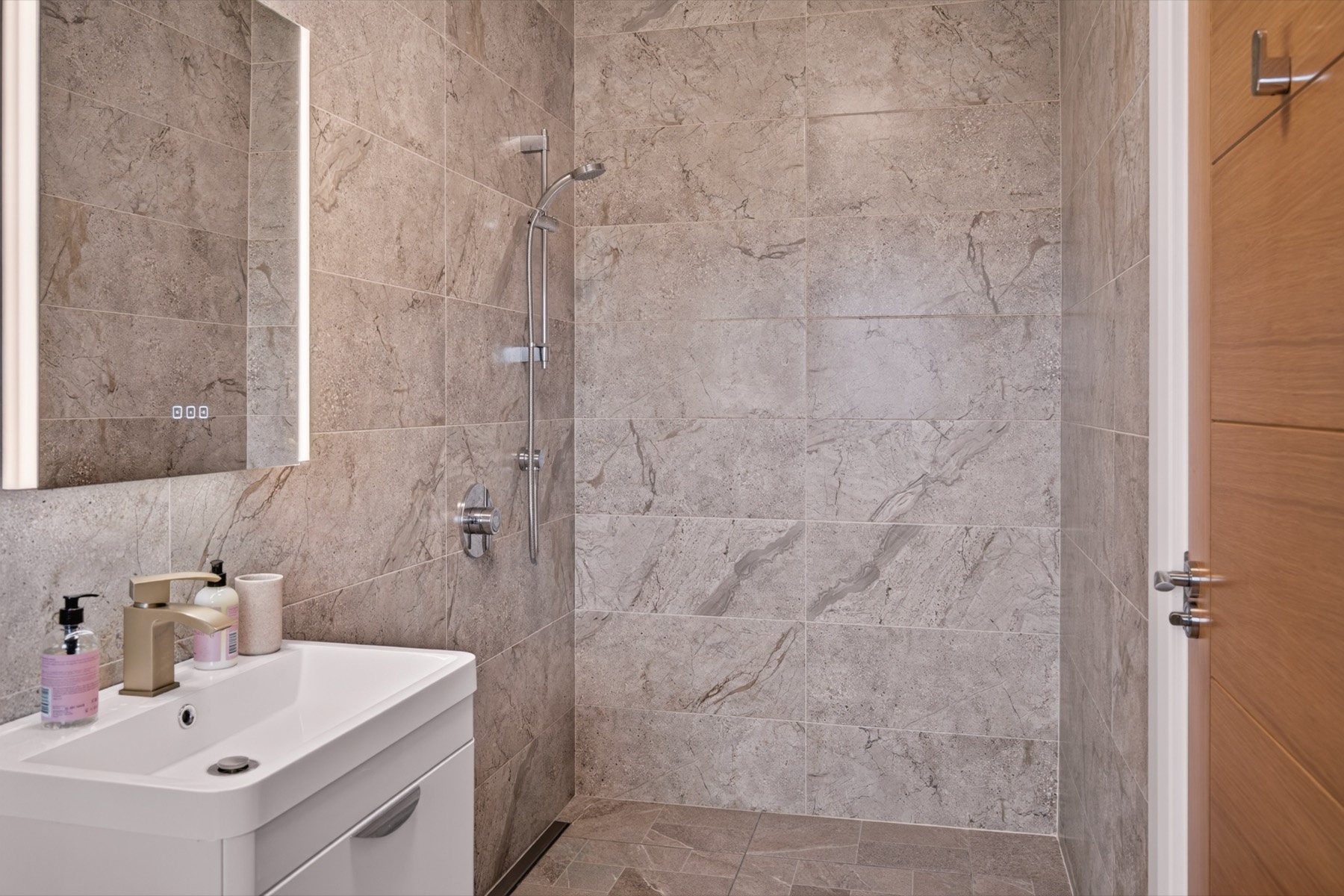 Elegant Ensuite Rooms — Beautifully appointed private rooms with their own marb