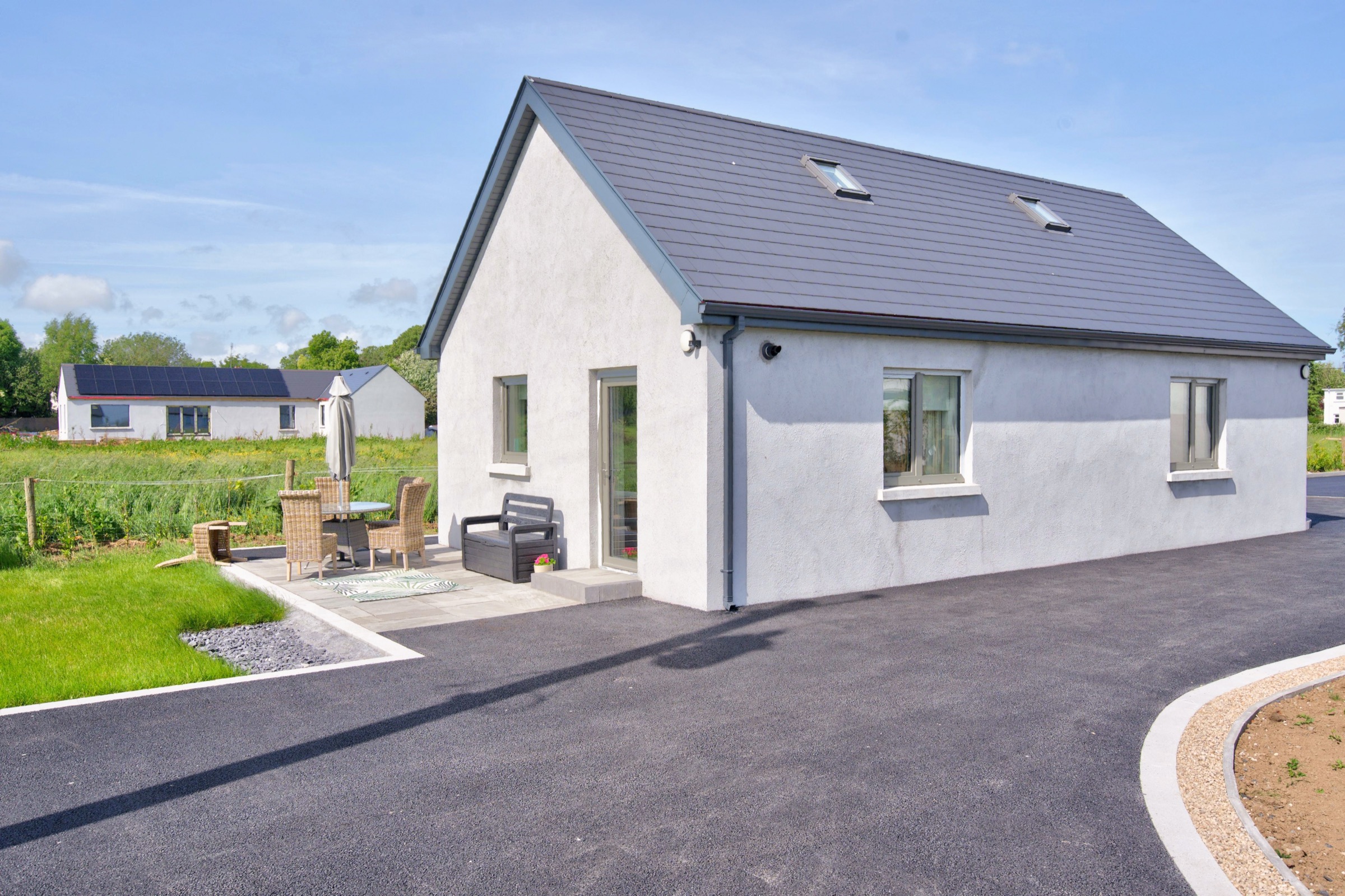 The Skylark Nest, a white cottage apartment with garden in Oranmore, Galway