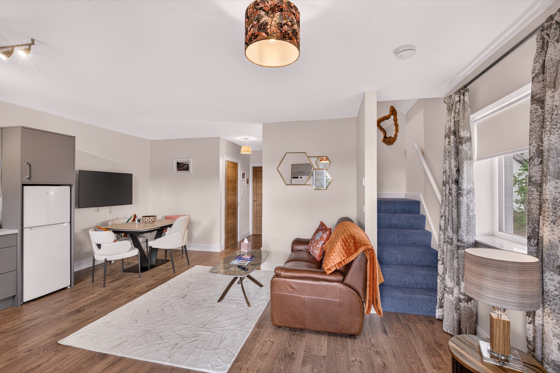 Open-Plan Living — Sleek, light-filled open-plan living with comfortable s
